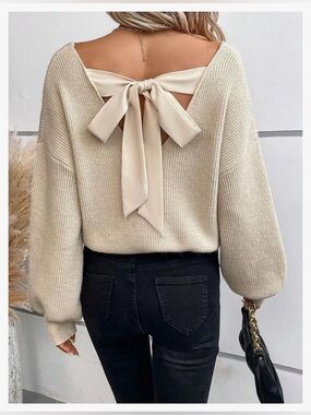 Ivy & Vines Oversized Off Shoulder Open Back Bow Open Back Sweater Beige.